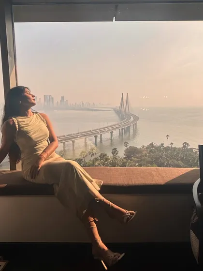Taking in the Mumbai skyline. The soft, neutral tone of the dress was a perfect complement to the golden hour light.