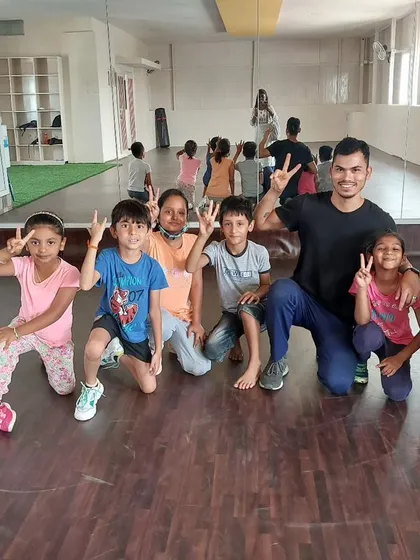 Fitness is for everyone, and it's amazing to start them young. This is a picture with my kids' fitness group, where we make getting active fun and build a foundation for a healthy life.