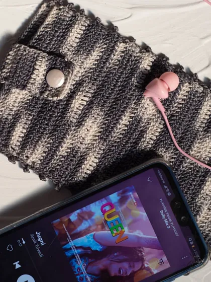 It also works perfectly as a soft case for your phone and earphones. The crochet material provides a cushioned layer of protection.