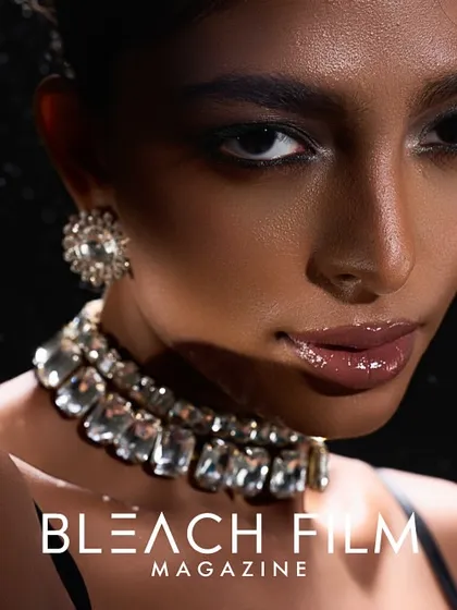 A great accessory shot is all about the details. Here, the focus is tight on the brilliant-cut diamond choker and earrings, with a high-gloss makeup look and subtle water effects to add a layer of raw elegance for a magazine feature.