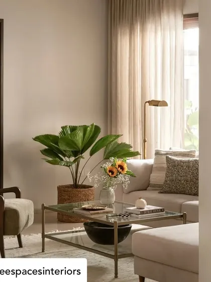 A detail shot from the Elle Decor featured home, showing our glass and metal coffee table. This piece adds a sense of lightness and modern elegance to the relaxed, Californian-hacienda-inspired living room.