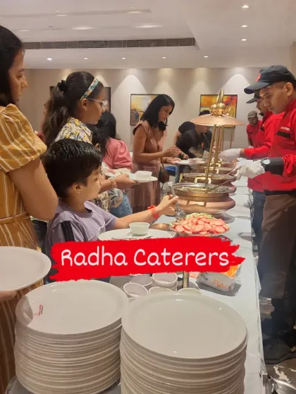 Guests helping themselves to a wide variety of dishes at our buffet. We ensure there are plenty of options to satisfy every palate.