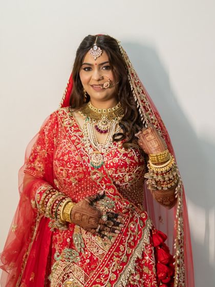 Another shot of the bride's complete look. The balance of traditional attire and fresh, modern makeup is my specialty.