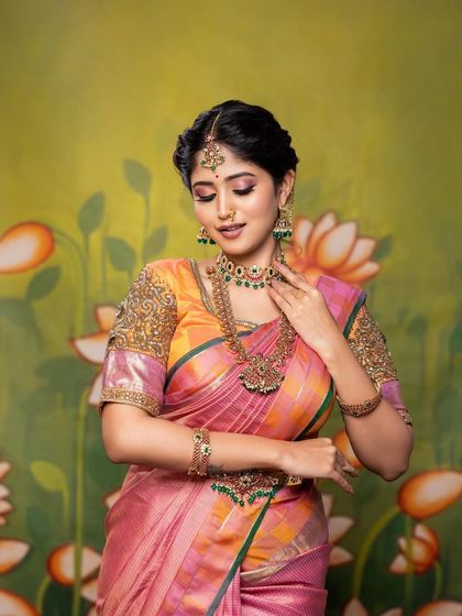 A beautiful, serene portrait from a creative shoot. The makeup is soft and pretty, with a focus on enhancing the model's natural features.