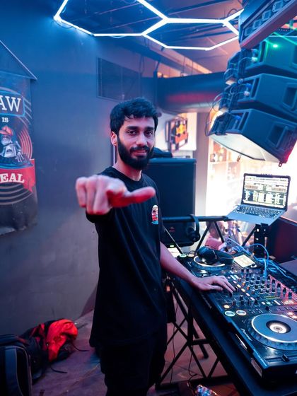 A direct-to-camera shot, inviting you to join the party.