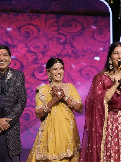 Sharing a joyful moment with the parents of the bride or groom. Their happiness is the heart of the celebration, and I love to highlight it.