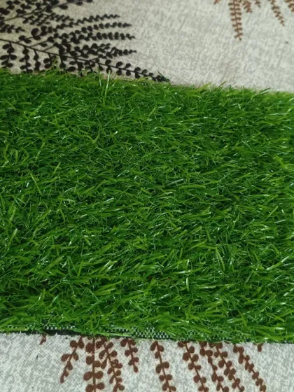 A sample of the 25mm artificial grass with a single backing. This is a practical and affordable turf for covering surfaces quickly and cleanly.