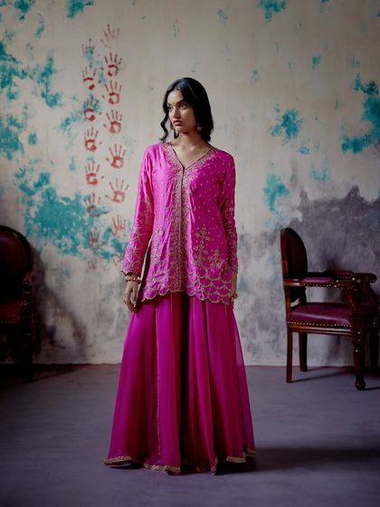 This extensive collection features a wide array of modern festive attire. From vibrant sharara sets and elegant anarkalis to chic jumpsuits and light lehengas, these pieces are curated for wedding guests and anyone looking for a stylish outfit for a special occasion.