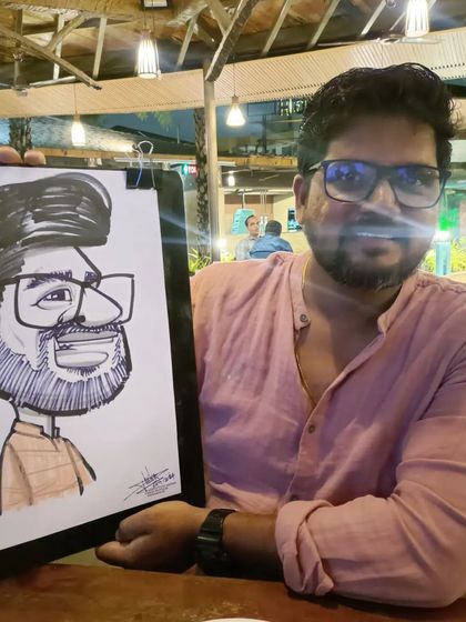 This guest's beard and glasses were fun features to sketch.