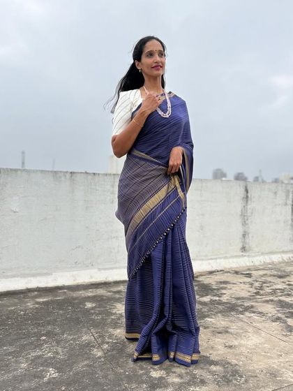 A full view of my client looking poised and elegant in her saree. Thank you for sharing.