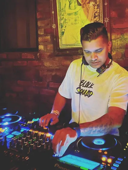 Playing a private gig at La Favela in Bali, a famous and eclectic nightclub. This shows my versatility in handling different types of venues and crowds.