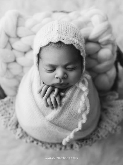 The black and white version of the basket pose, which adds a layer of classic elegance and focuses purely on the light, shadow, and emotion of the moment.