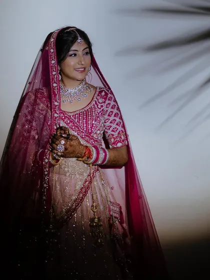 The complete bridal look for Mamta. Her makeup was designed to be both elegant and striking, perfectly suiting her grand wedding attire.