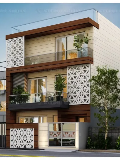 We specialize in creating unique facade elements like the intricate metal jali screens on this 202 sq. yard home in Rajender Nagar. These screens provide privacy and sun shading while adding a decorative, geometric pattern that makes the building's exterior truly distinctive.