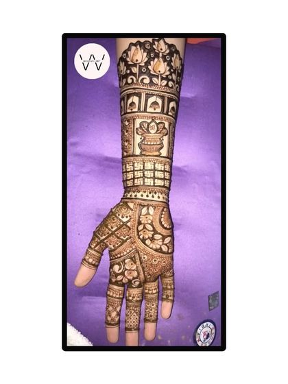 A special design for a Tapasvi (Jain ascetic) ceremony, featuring a kalash and other religious symbols.