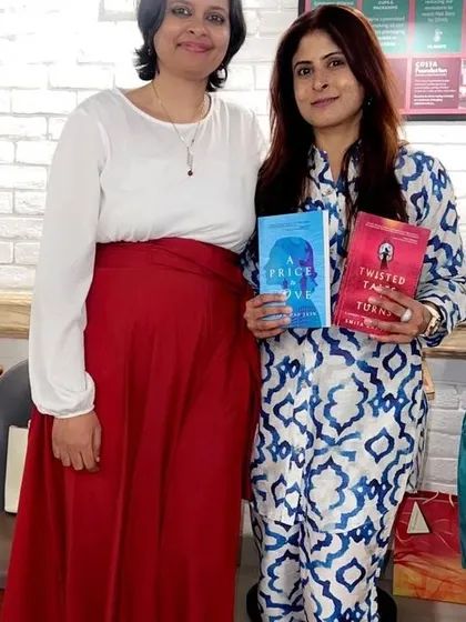 Posing with author Smita Das Jain and her books, "A Price to Love" and "Twisted Tales and Turns." It was a pleasure to host her for a second time and explore her new collection of stories.
