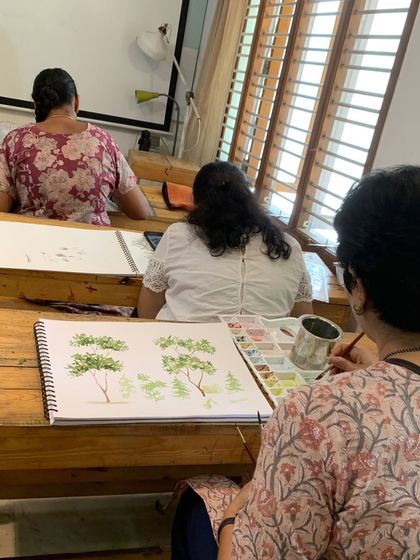 Our classroom is designed for structured learning. Here, students practice fundamental exercises like tree strokes, building the discipline and skill needed for more advanced work.