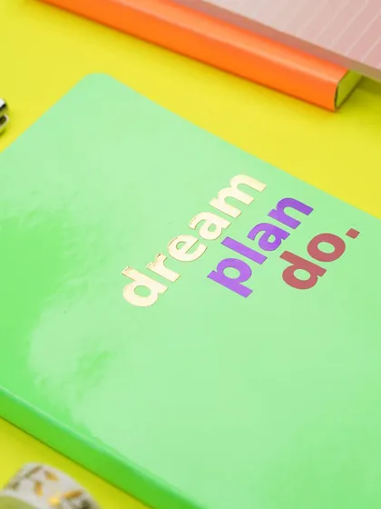 A collection of our work for stationery brands. These images feature a variety of products like planners, notepads, journals, and flash cards, styled in both professional and creative settings to showcase their versatility.