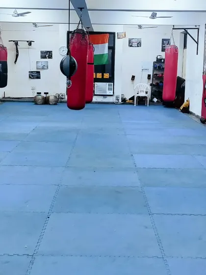 The training floor with multiple heavy bags ready for our students to work on their power and technique.