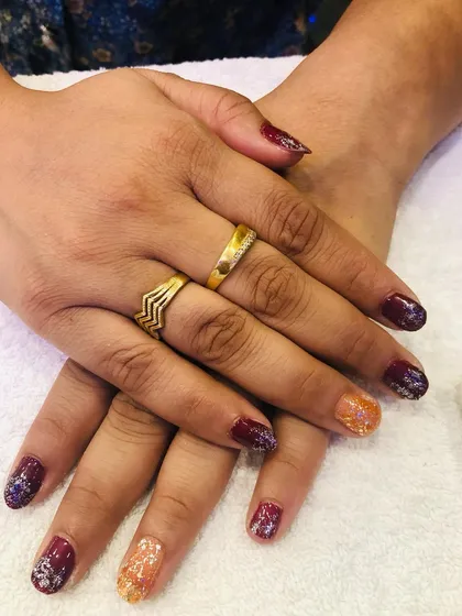 A festive glitter set, perfect for the holidays, with a mix of red and gold glitter.