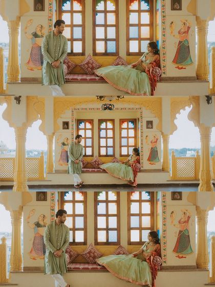 A regal portrait of the couple during their Mehendi, set against a backdrop of traditional Rajasthani art. This shot blends candid emotion with artistic composition.