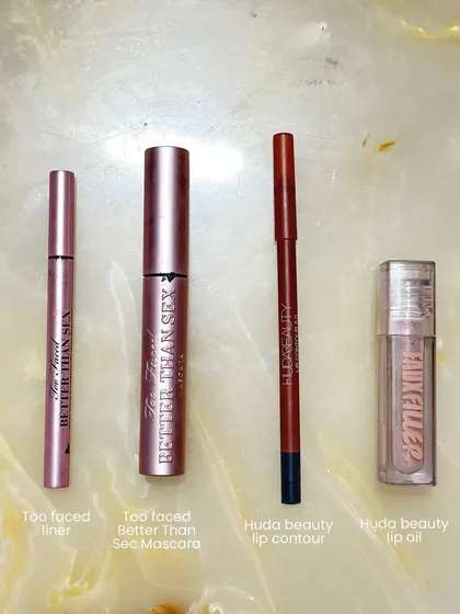 For defined eyes and lips, these are my go-to products. A great liner, mascara, lip contour, and lip oil are essential for any complete makeup kit.