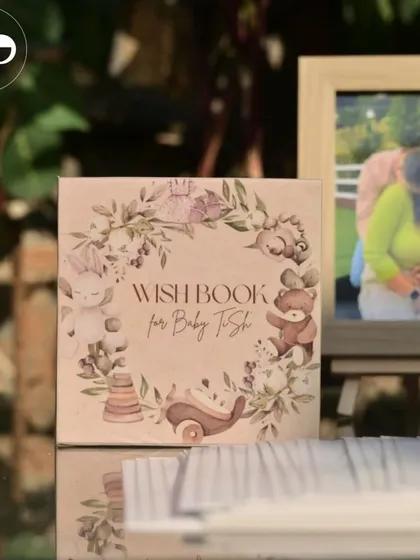 A custom 'Wish Book' for guests to leave messages for the baby. This becomes a treasured memento for the family to look back on for years to come.