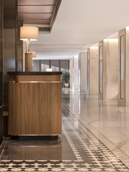 The main corridor at the Soaltee Hotel is designed to be more than a simple passageway. Polished marble floors, elegant console tables, and soft lighting create a gallery-like feel, while the geometric floor pattern subtly guides guests toward the main hotel spaces.
