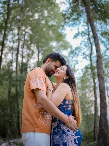 An intimate embrace surrounded by the quiet beauty of a Manali forest. I aim to capture the warmth and comfort you find in each other, with nature as our beautiful backdrop.