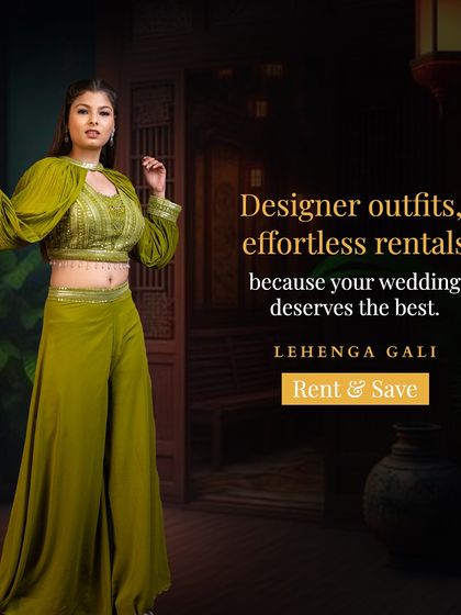 Designer outfits, effortless rentals. This olive green palazzo set with statement sleeves is a bold and fashionable choice for a cocktail party or sangeet.