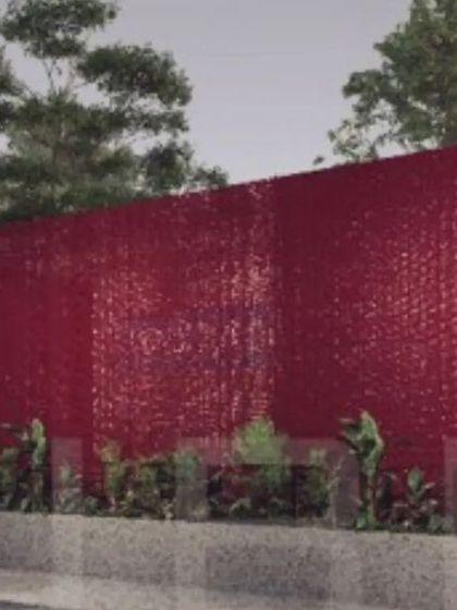 A rendering of our business hub project in Tiruppur, which uses composite panels made from recycled PET bottles. The bold red metal shell creates a landmark building for the textile industry, showcasing sustainable and affordable construction.