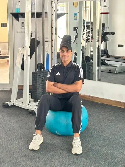 A relaxed but confident pose. Fitness should make you feel good inside and out.