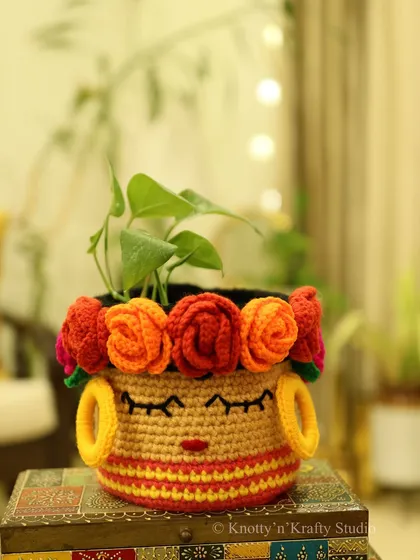 Bold and beautiful, my Frida Basket is a statement piece. Here it is used as a planter, with the green leaves of the plant beautifully complementing the colorful flowers on the basket.