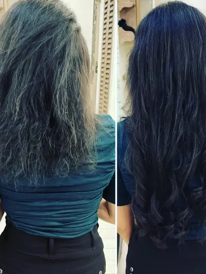 This before-and-after shows a transformation from frizzy, undefined hair to a smoother, longer style with gentle waves at the end for a soft, polished look.
