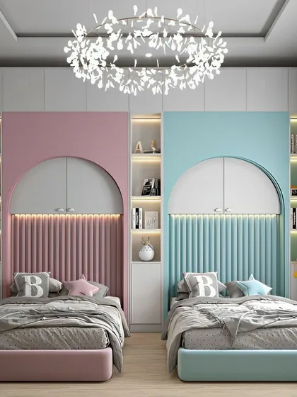 We designed this beautiful shared bedroom with a symmetrical layout to create a sense of harmony and personal space for two children. The design features custom arched headboards with fluted paneling, integrated shelving with ambient LED lighting, and a distinct color palette for each side, blending modern aesthetics with child-friendly personalization.
