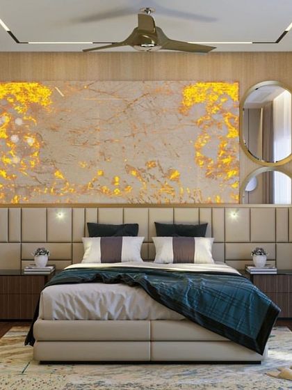 For this bedroom, we used a backlit Feldspar White Italian marble slab as a dramatic headboard. The warm glow highlights the stone's natural patterns, creating a magnificent focal point.