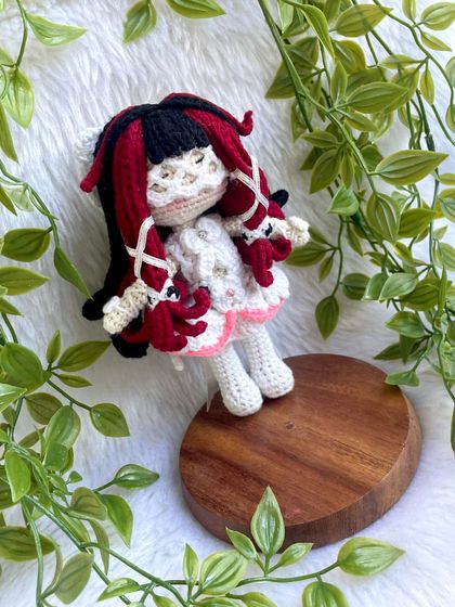 This is Columbina Damselette, a beautifully detailed anime character. The intricate hairstyle with red and black locks and the delicate white dress was a challenge I truly enjoyed creating.