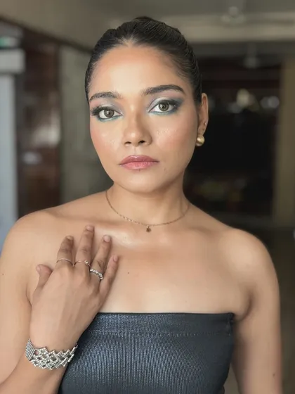 A direct look at the camera, showing the intensity and power of a well-executed smokey eye. This is a timeless look that always turns heads.