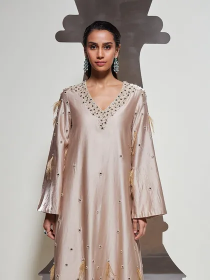 A detailed shot of the Dara Kurti Set's neckline, highlighting the exquisite hand embellishments that make this piece a work of art.