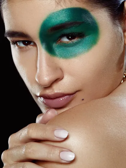 A student's second portfolio shoot gets a whole lot greener and glam with this bold, circular green eyeshadow look.