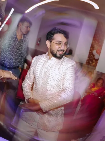 I love using creative techniques like a slow-shutter swirl to capture the dynamic energy of the Sangeet dance floor. It adds a fun, artistic blur of motion and color.