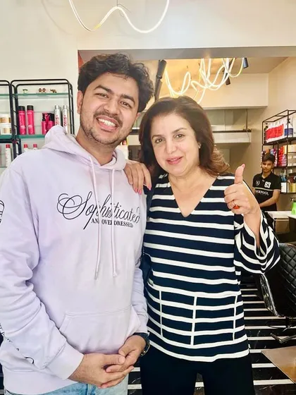 The one and only Farah Khan shines at my salon after a stunning cut and color. It’s an honor to have such legendary figures in my chair.