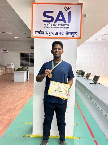 A proud gold medalist from Team Eklavya at the Karnataka Mini Olympic games.