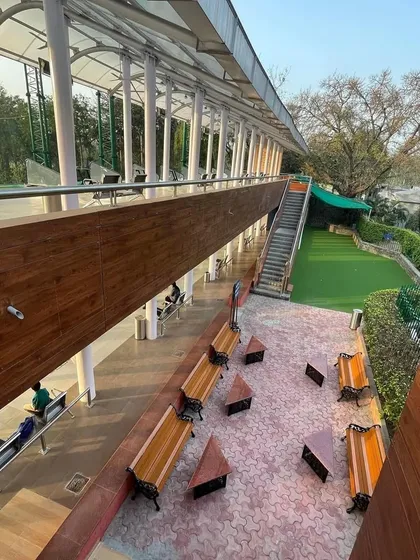A view from the upper tier, showing the two levels of our driving range and the comfortable seating area for friends and family.