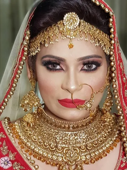 A direct look from my beautiful Nikah bride. You can see the precision of the eye makeup and how the contoured base enhances her facial structure, creating a powerful and confident bridal portrait.
