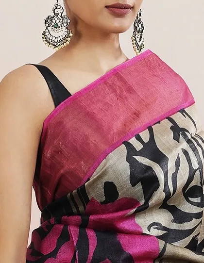 A close-up of the abstract floral print, contrasted with the bold pink border.