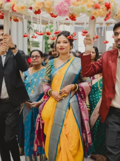 The grand bridal entry. This makeup is designed to be flawless and radiant, ensuring the bride is the center of attention as she walks in under the 'phoolon ki chadar'.