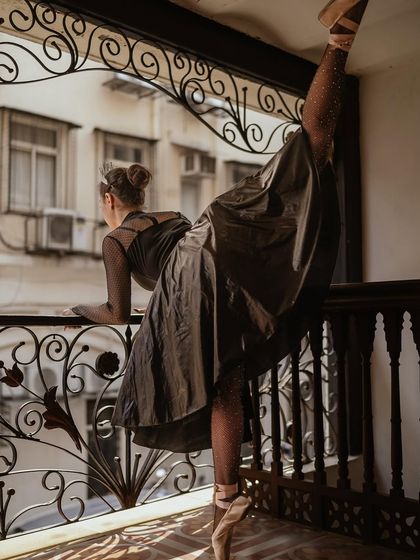 Using the architecture of the venue as our stage. This shot captures the blend of classical ballet and the beautiful environment of the opera house.
