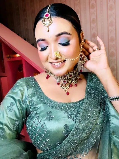 A close-up of the eye makeup for this look. I used a blend of blue and silver eyeshadow to create a unique and stunning effect that complements the outfit.