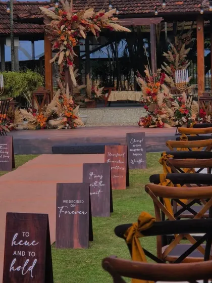I believe the journey to the altar should be meaningful. These custom-designed aisle signs feature quotes that are special to the couple, making their wedding procession even more personal.